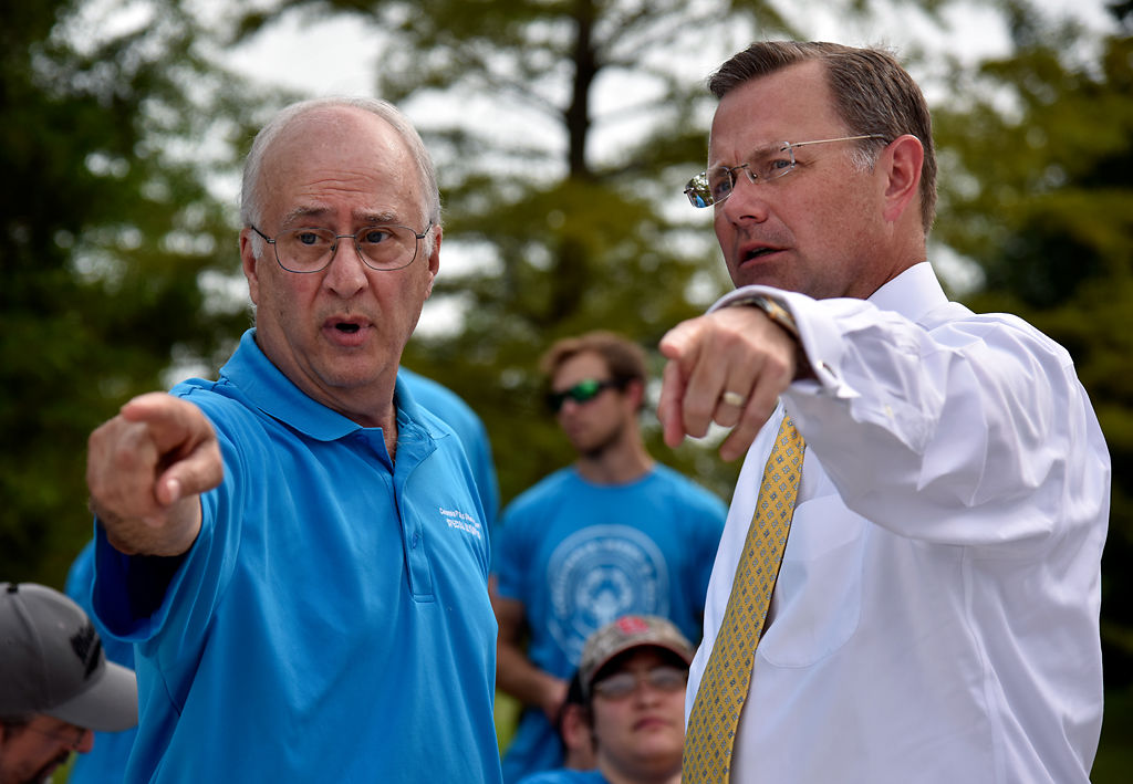 Frank La Mantina points out the areas of the court to Mayor Brian Treece